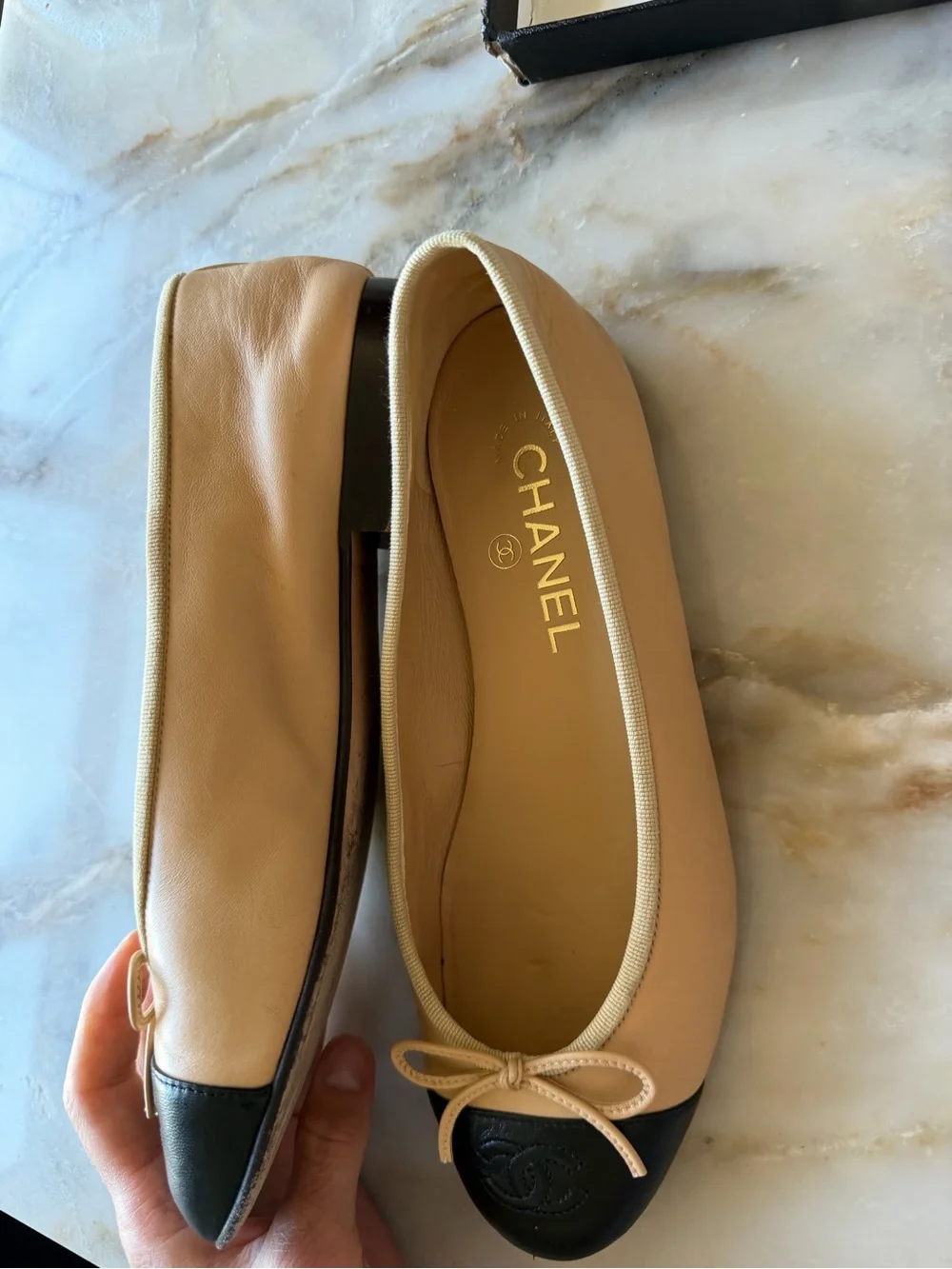 CHANEL Beige and Black Leather Cap-Toe Ballet Flats